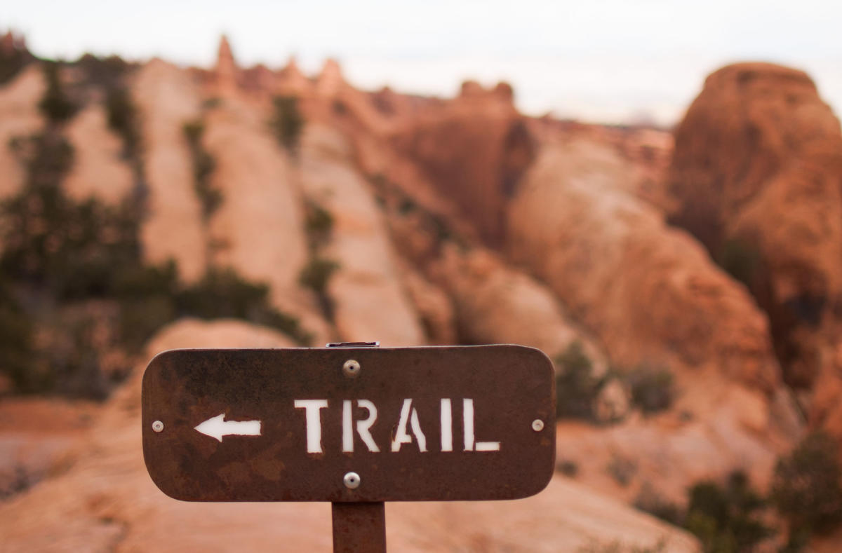 Sign in Arches National Park reading "trail"