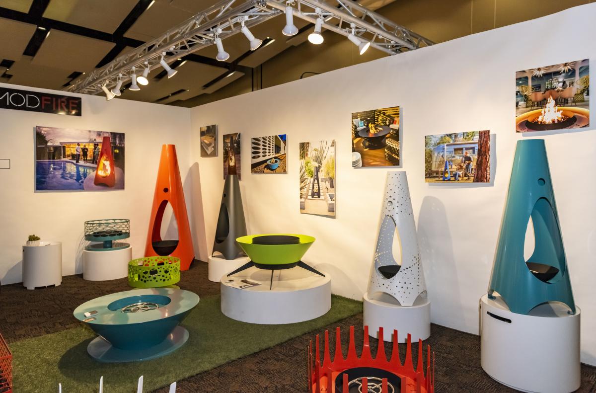 An exhibition of colorful home decor and paintings at the Modernism Show & Sale.