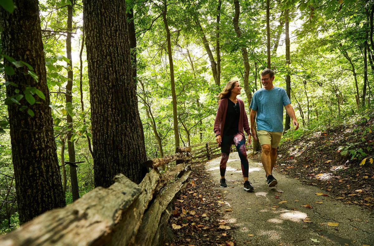 Couple walking through The Springfield Conservation Nature Center