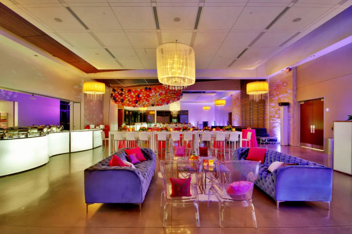 The event space at Mark Arts has been design with colorful lighting and seating by Xclusive Events