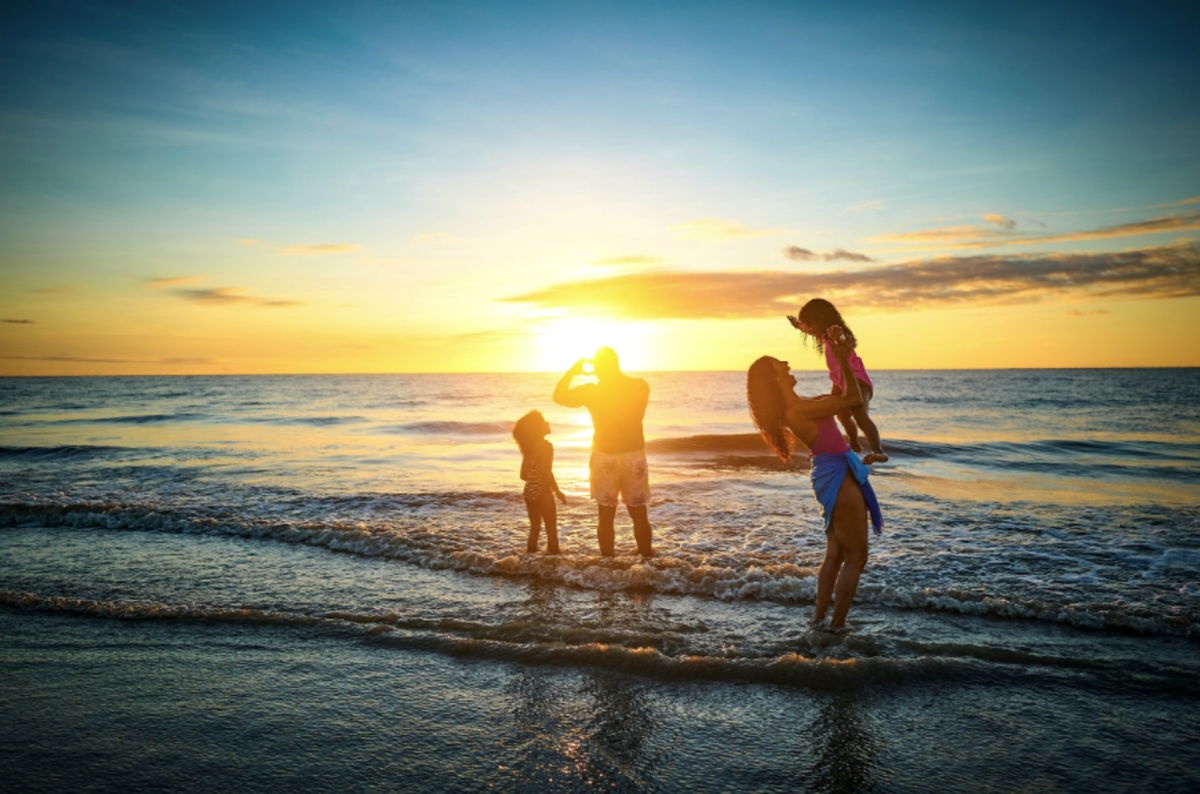 Family at East Beach on St. Simons Island