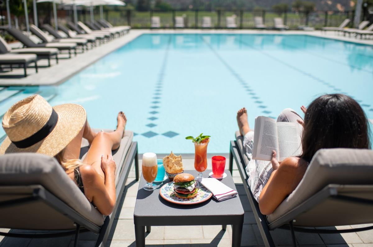 women lounging at Four Seasons pool
