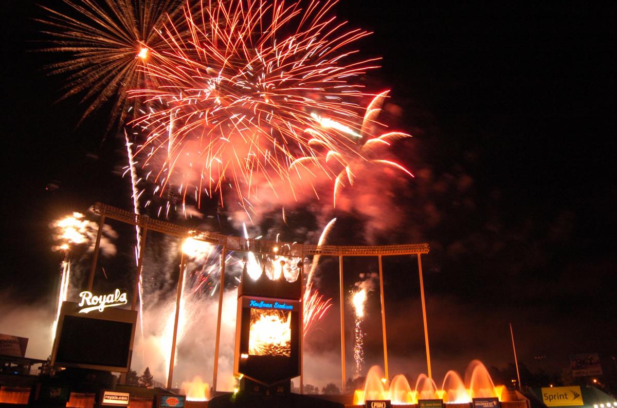 Red fireworks explode in celebration above Kauffman Stadium after a win by the Kansas City Royals.