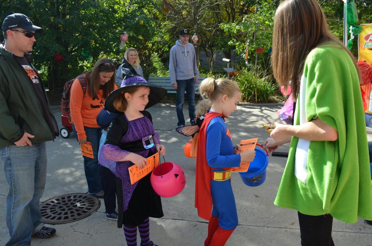 Boo at the Zoo kids with pumpkins and costumes