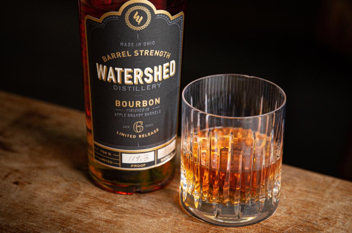 Watershed Barrel Strength Bourbon Next To A Glass