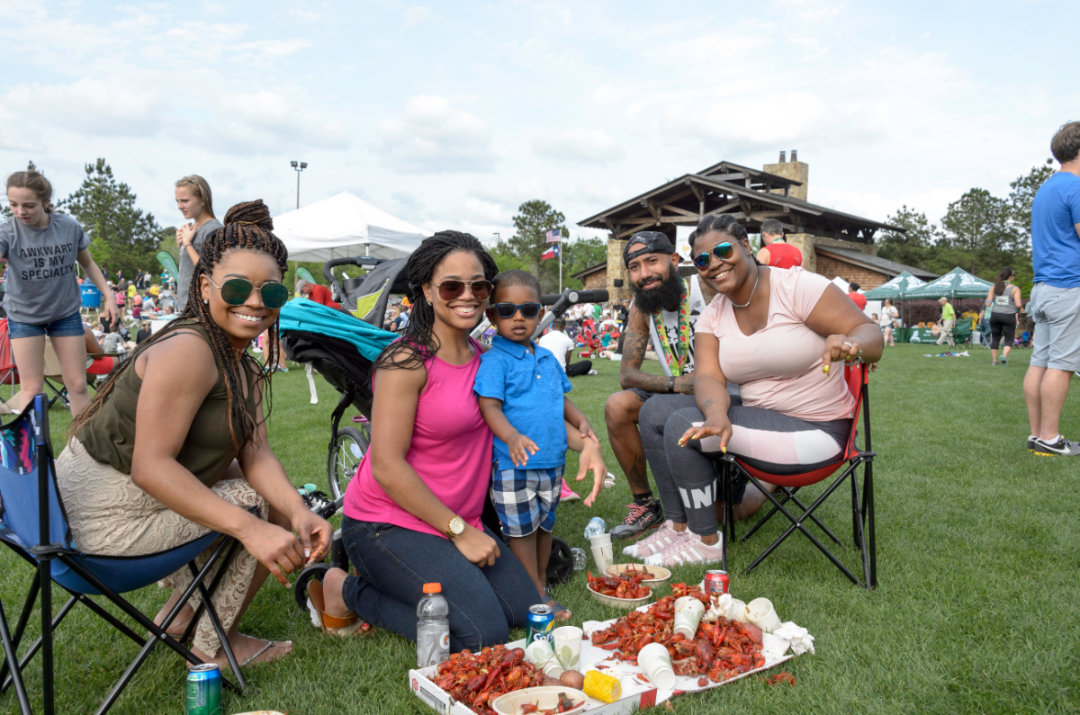 Group eating crawfish at the Muddy Trails Bash