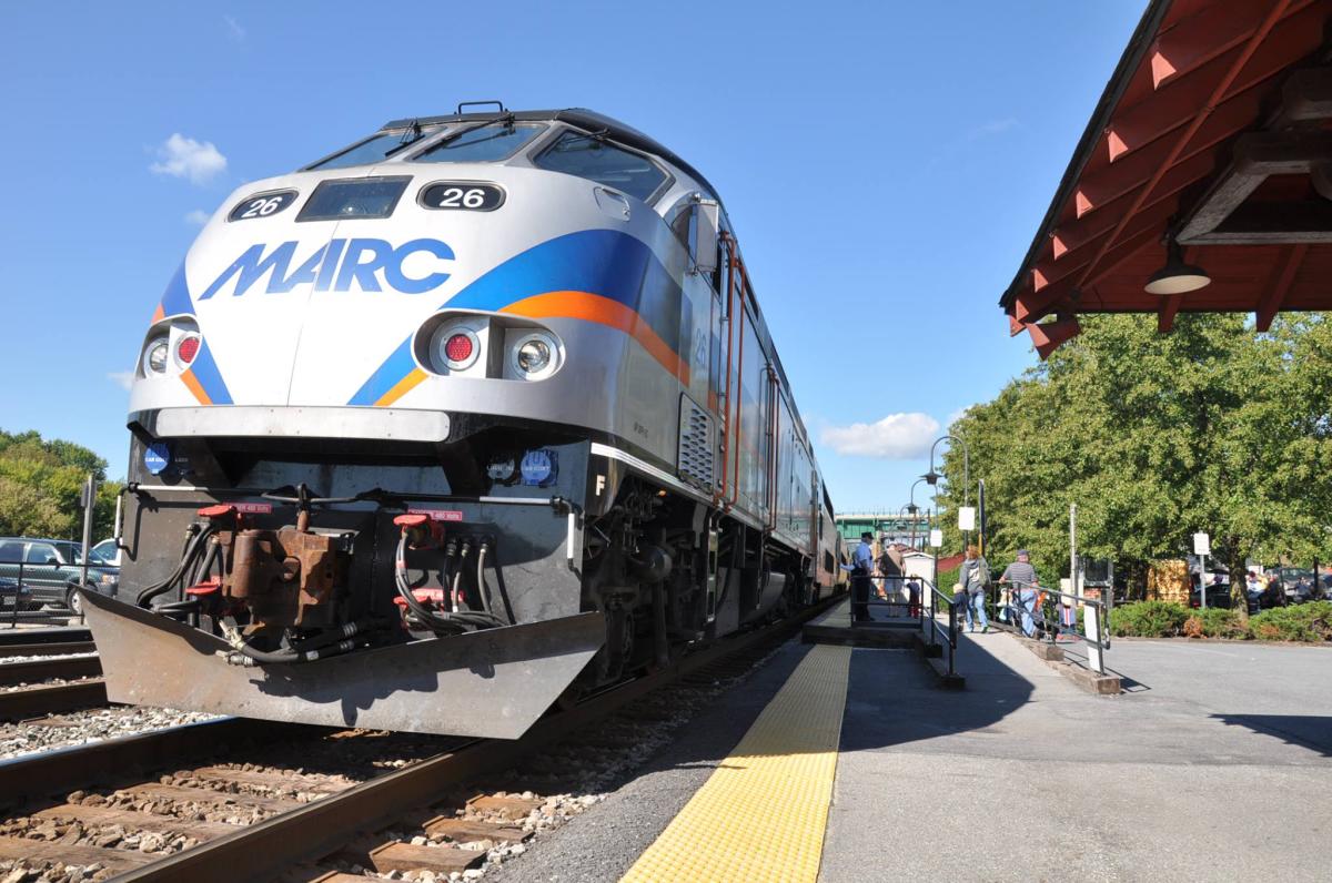 MARC Train stopped at the Brunswick Train Station as people board