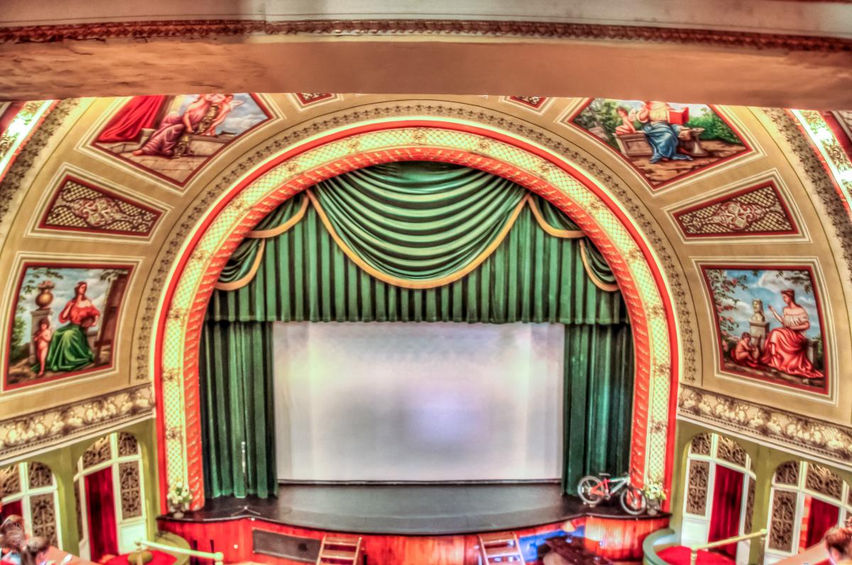 Beautiful paintings surround the historic Calumet Theater Stage