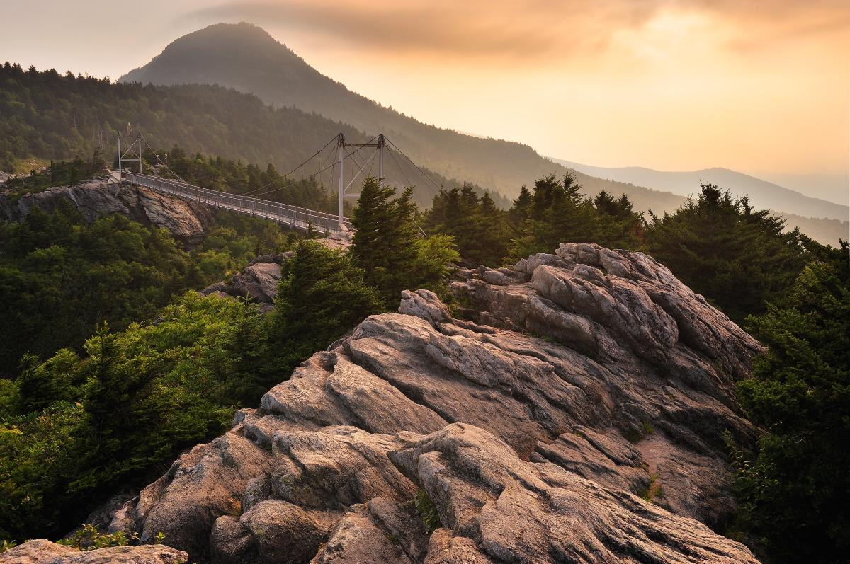 Grandfather Mountain's famous Mile High Swinging Bridge at sunrise.