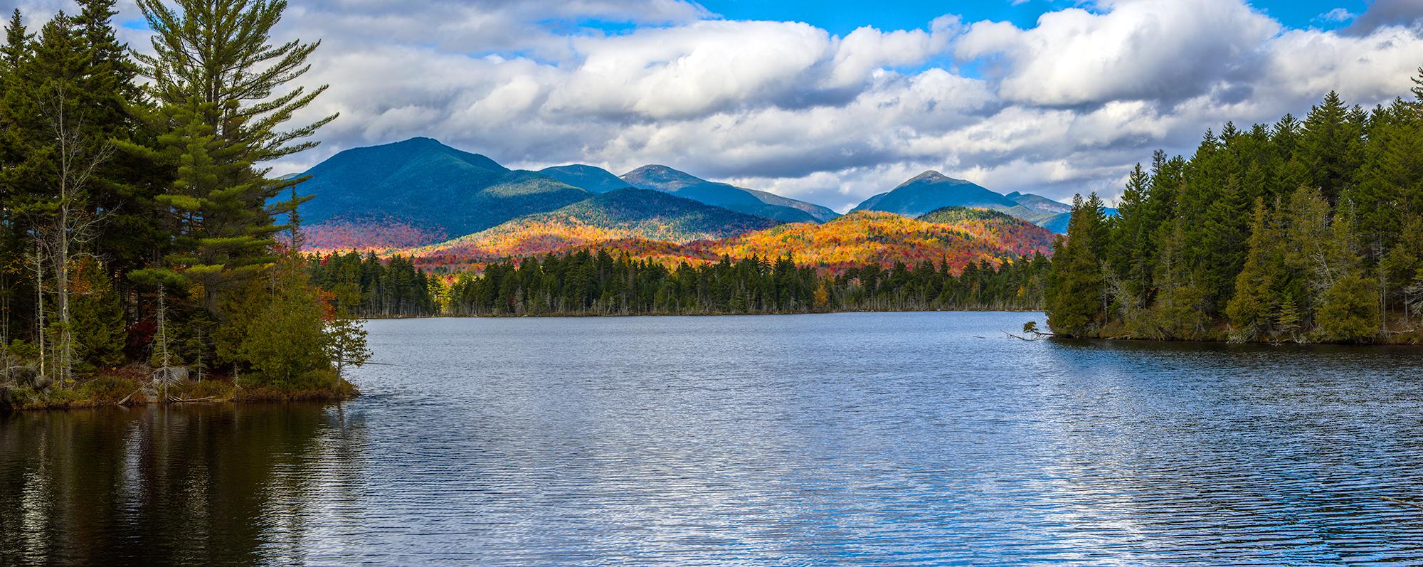 The Adirondack High Peaks seen from Boreas Pond in North Hudson during fall foliage season