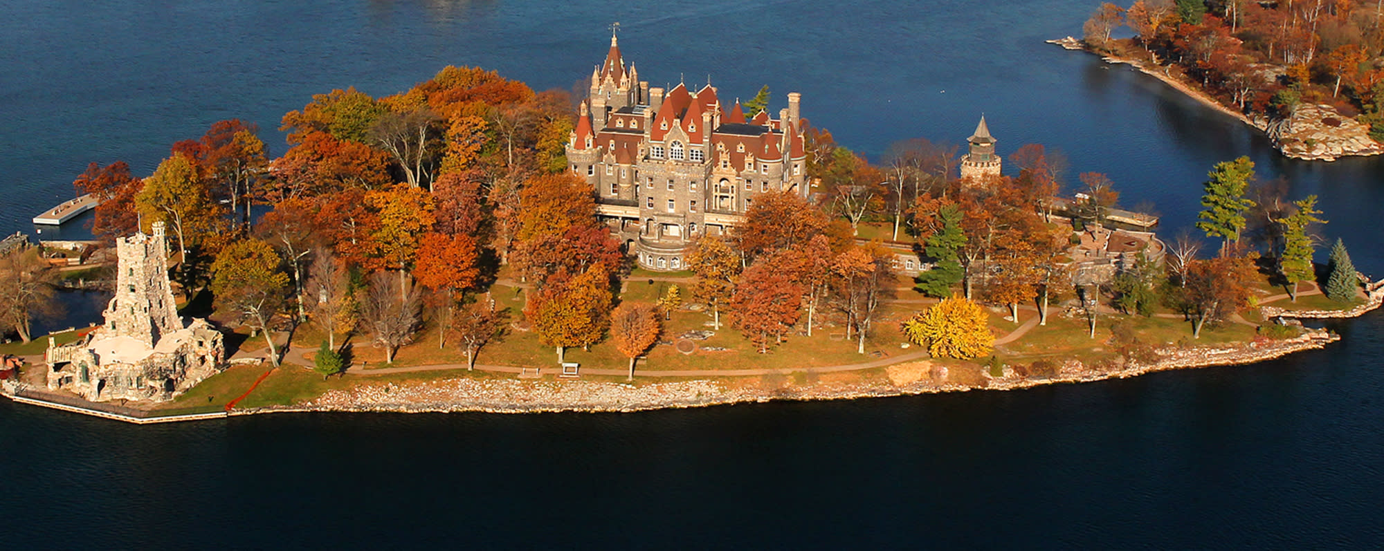 An aerial view of Boldt Castle amid fall foliage