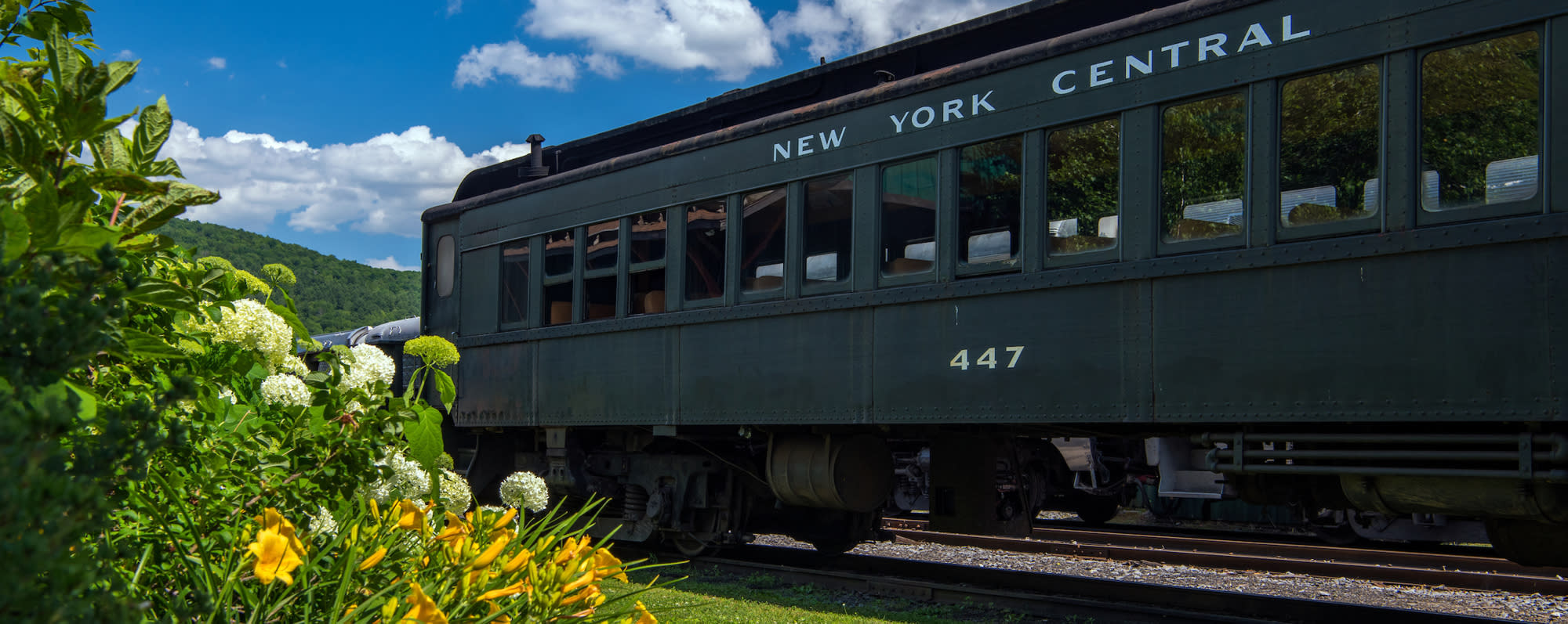 A photo of a train cart on the Delaware & Ulster County Railroad