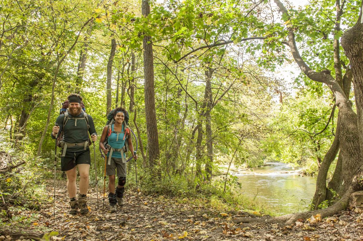 Couple with hiking gear along the Appalachian Trail