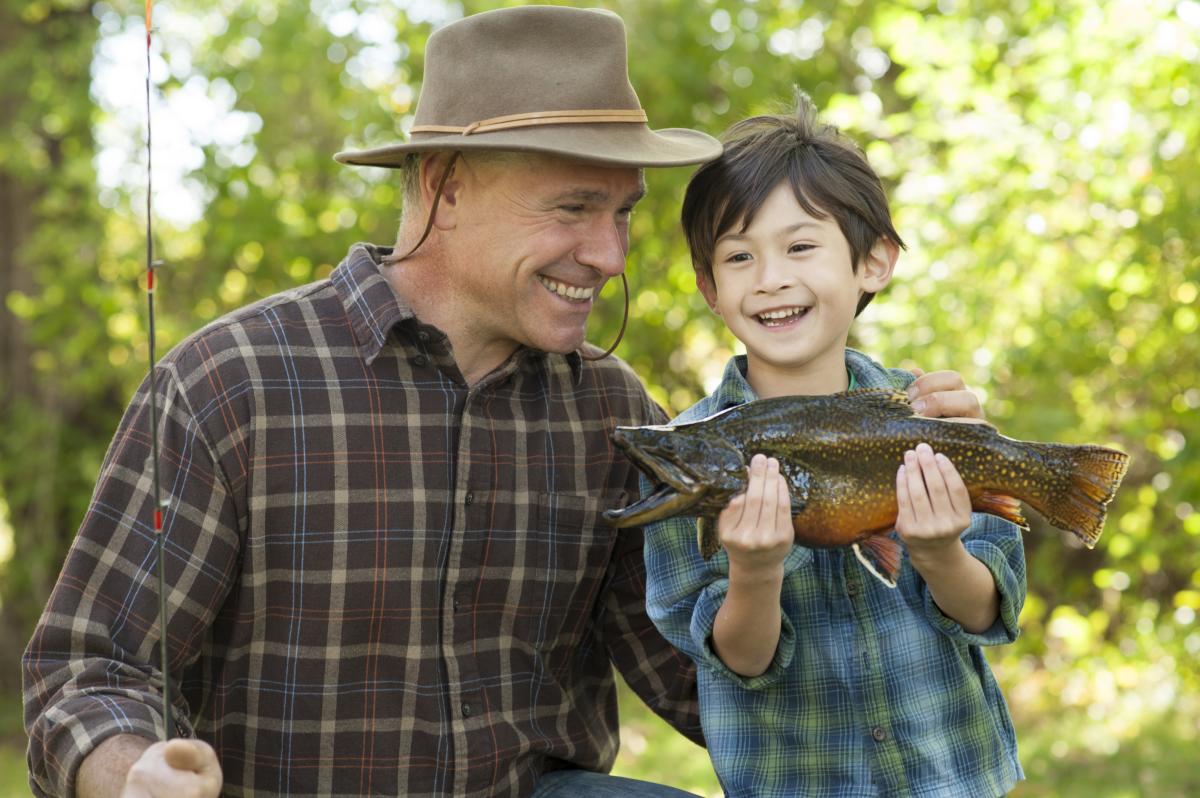 Grandfather and Grand Son catch a fish