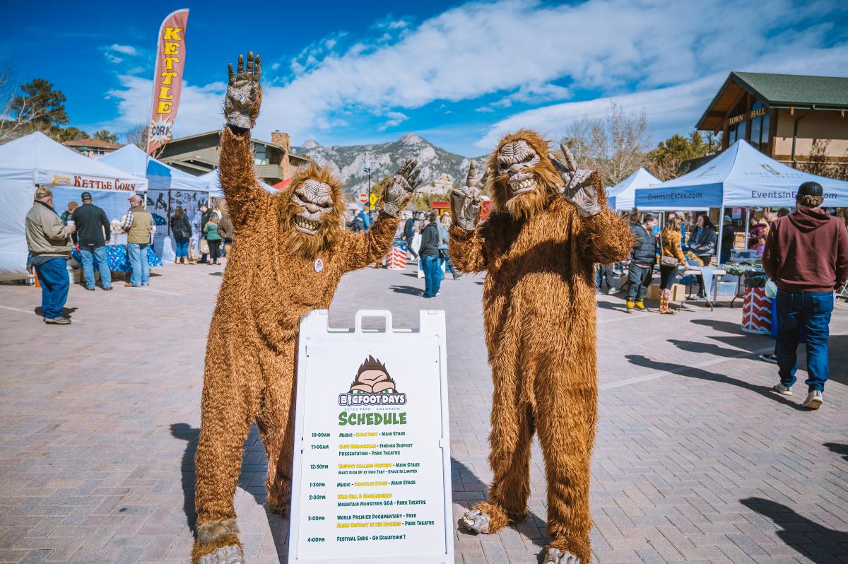 Two people dressed up in Bigfoot costumes
