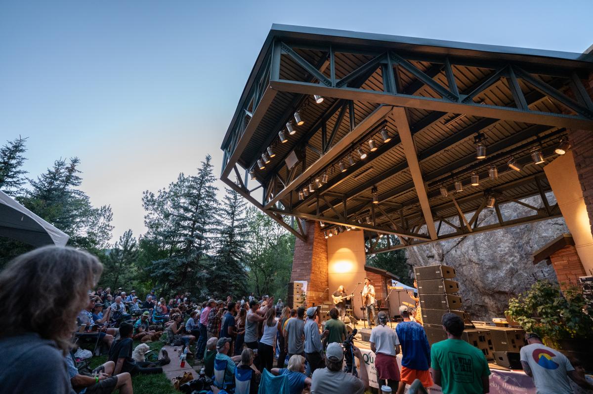 Crowd watching a band perform at Performance Park Amphitheater.