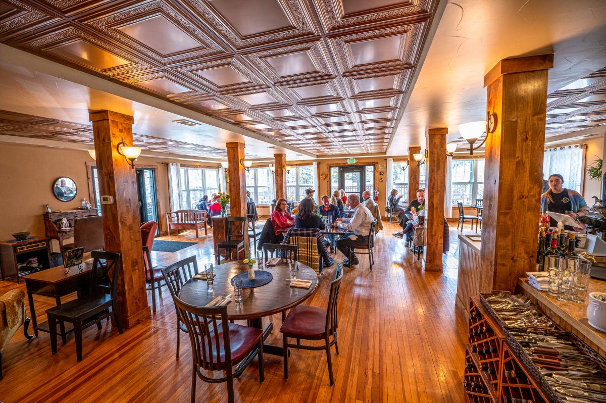 Guests eating inside the dining area of Seasoned