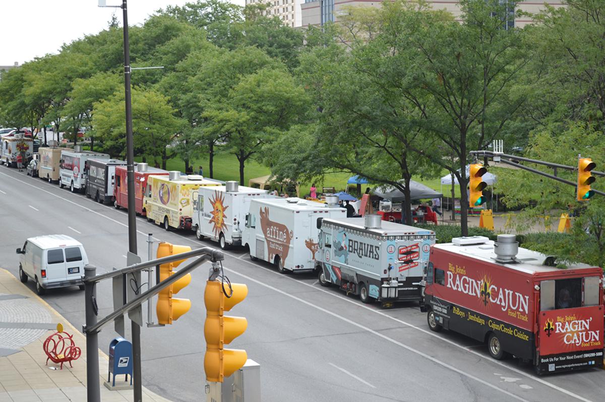 Food trucks lined up and waiting for patrons before lunch hour in Fort Wayne, IN.