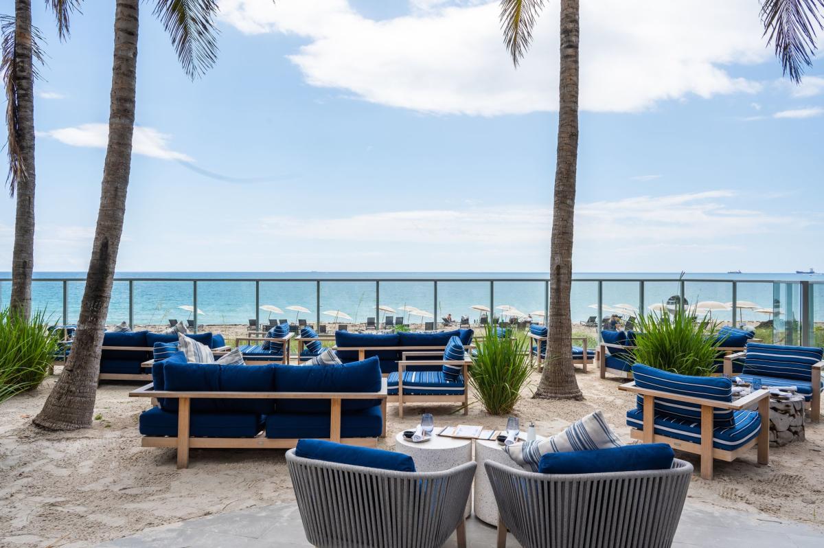 Patio Overlooking The Ocean At Dune by Laurent Tourondel In Fort Lauderdale