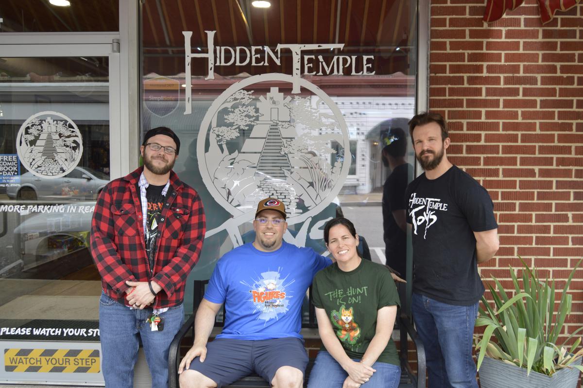Hidden Temple Toys Staff pose in front of the store in Downtown Selma, NC.