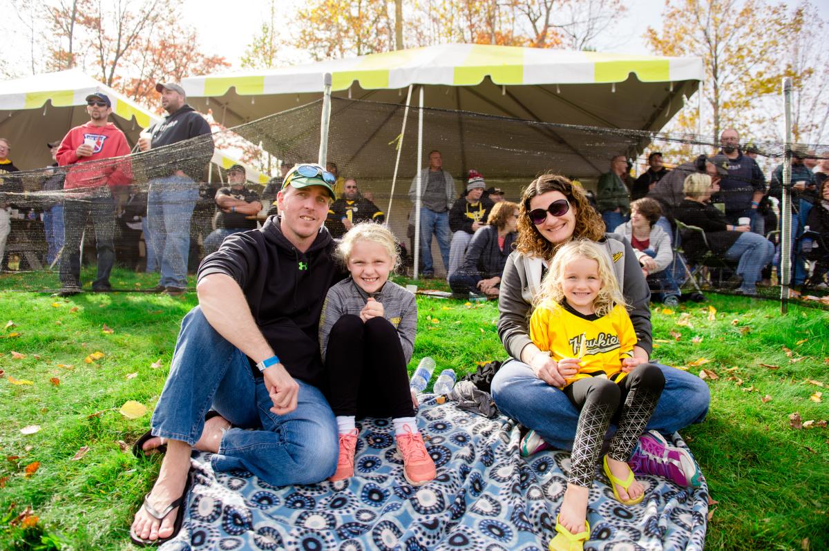 A family watching football game at Michigan Tech