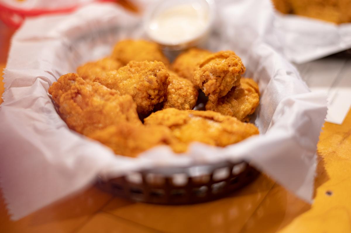 a basket of fried wings