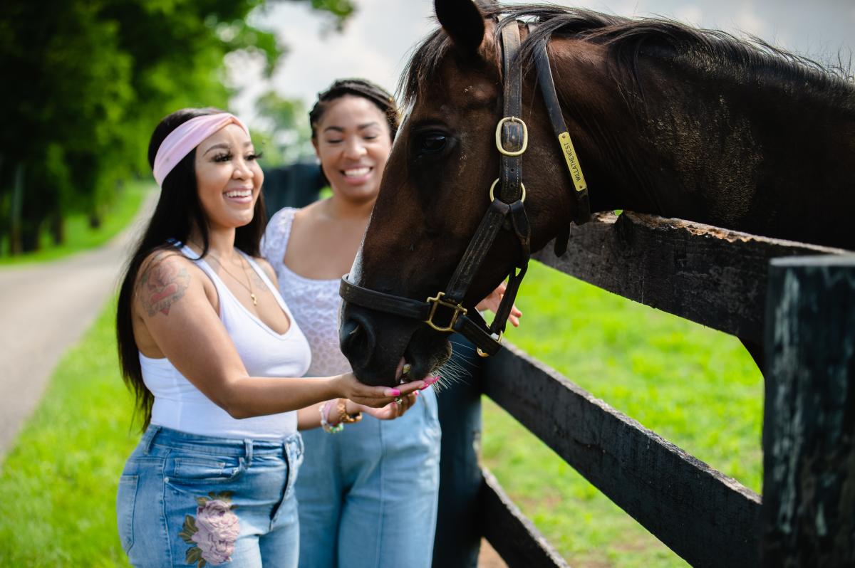 Two women and a horse