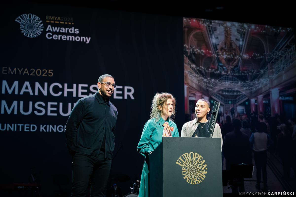 Manchester Museum team accepting award on stage