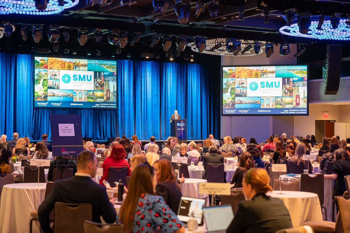 Delegates sat at round tables in a large hotel ballroom