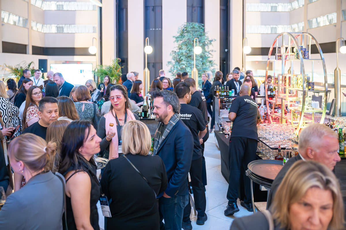 Manchester hosts a reception in a large New York hotel atrium