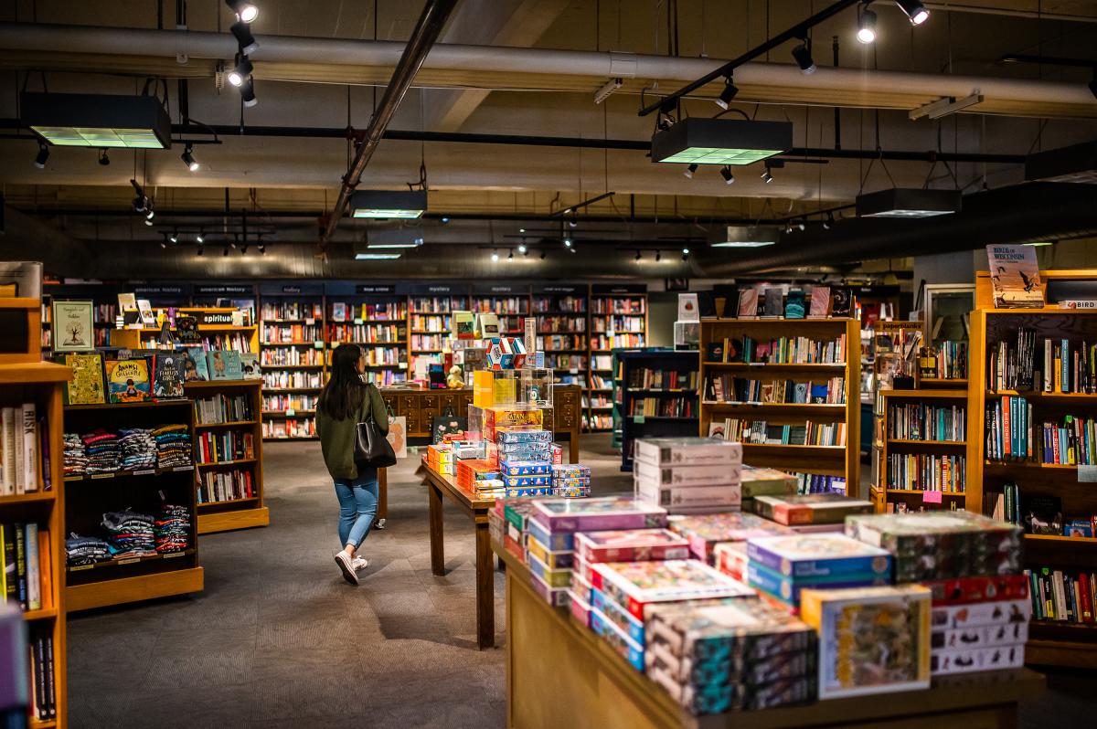 rows of shelves and tables of books