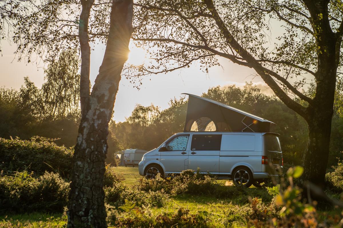 Van parked up at Camping New Forest Site