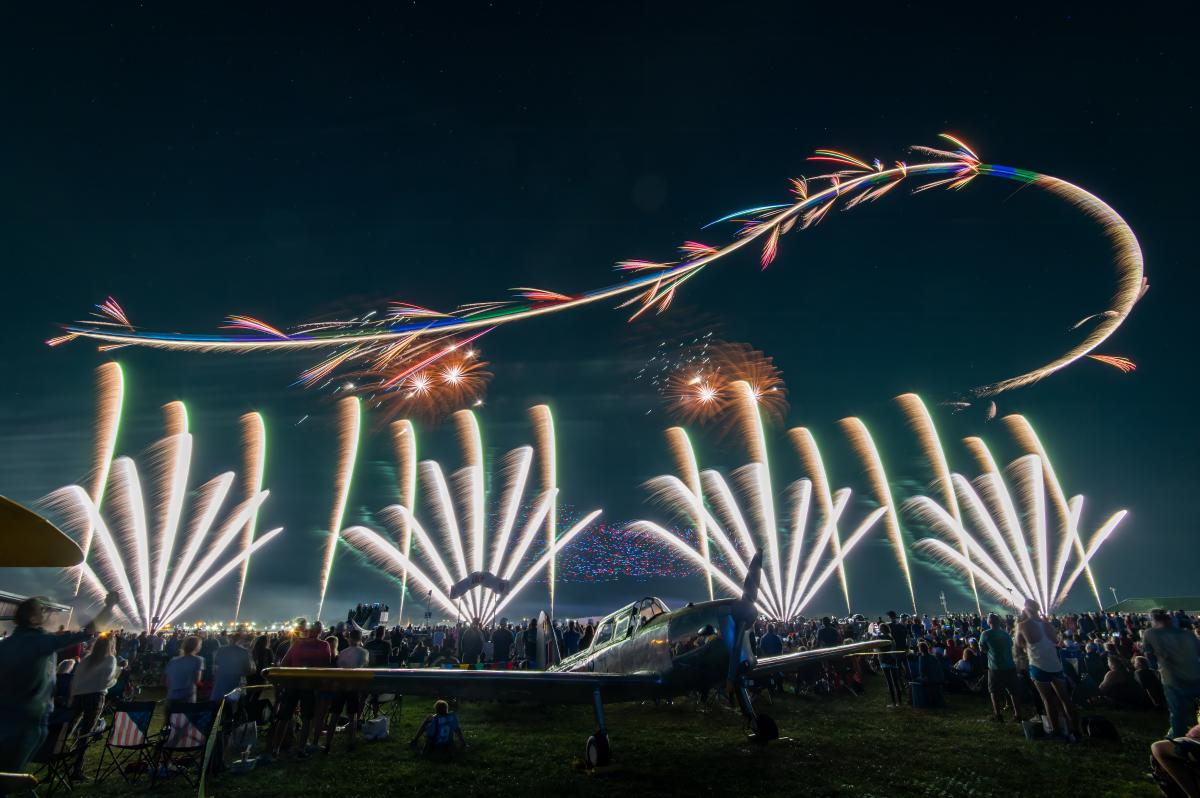 The night air show always dazzles at EAA AirVenture Oshkosh. In 2025, the night shows are on July 23 and 26. (EAA photo/Michael Dziadus)
