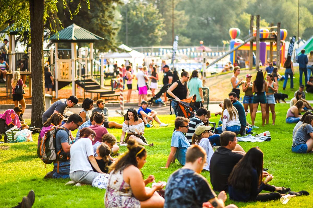 People Gathered At An Outdoor Event