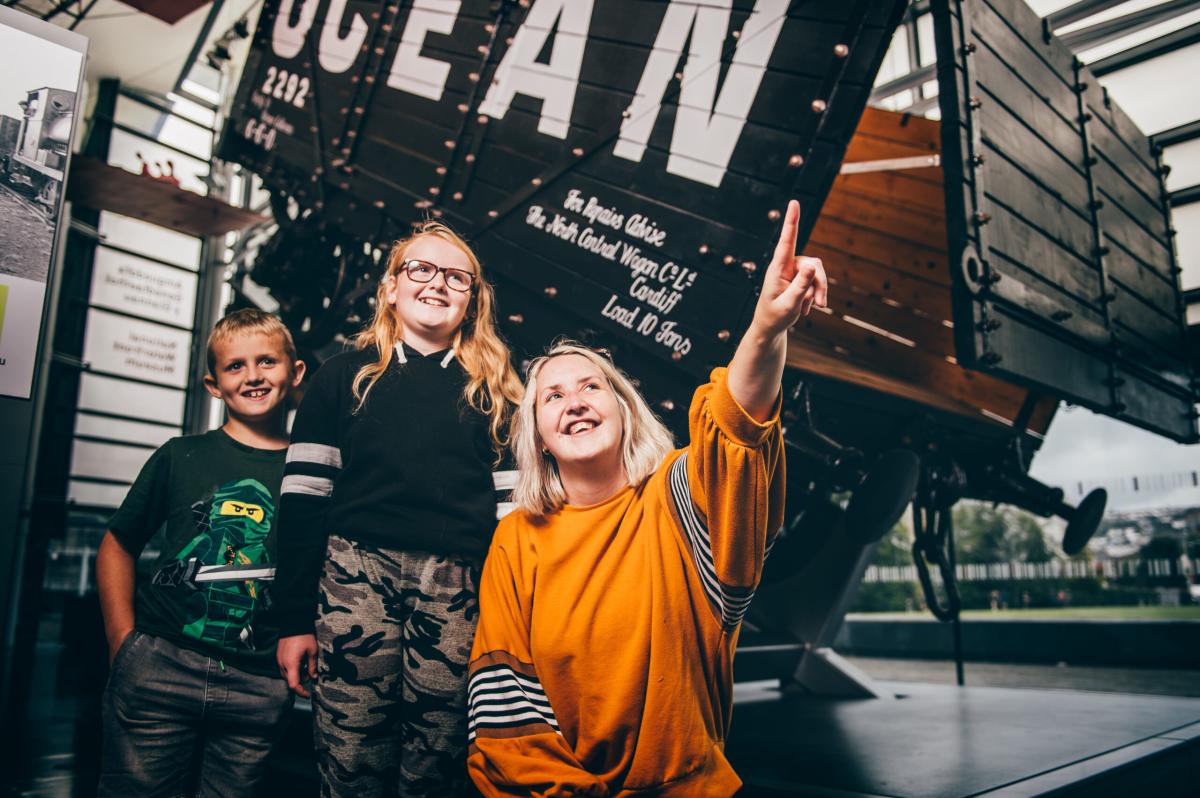 Three children in the National Waterfront Museum.