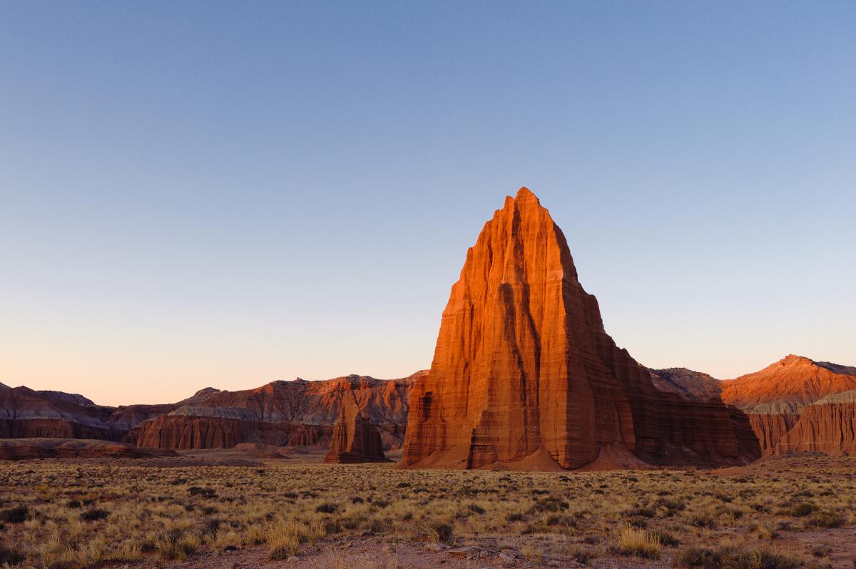 Sharp Cathedral Valley peak at Capitol Reef National park at sunset
