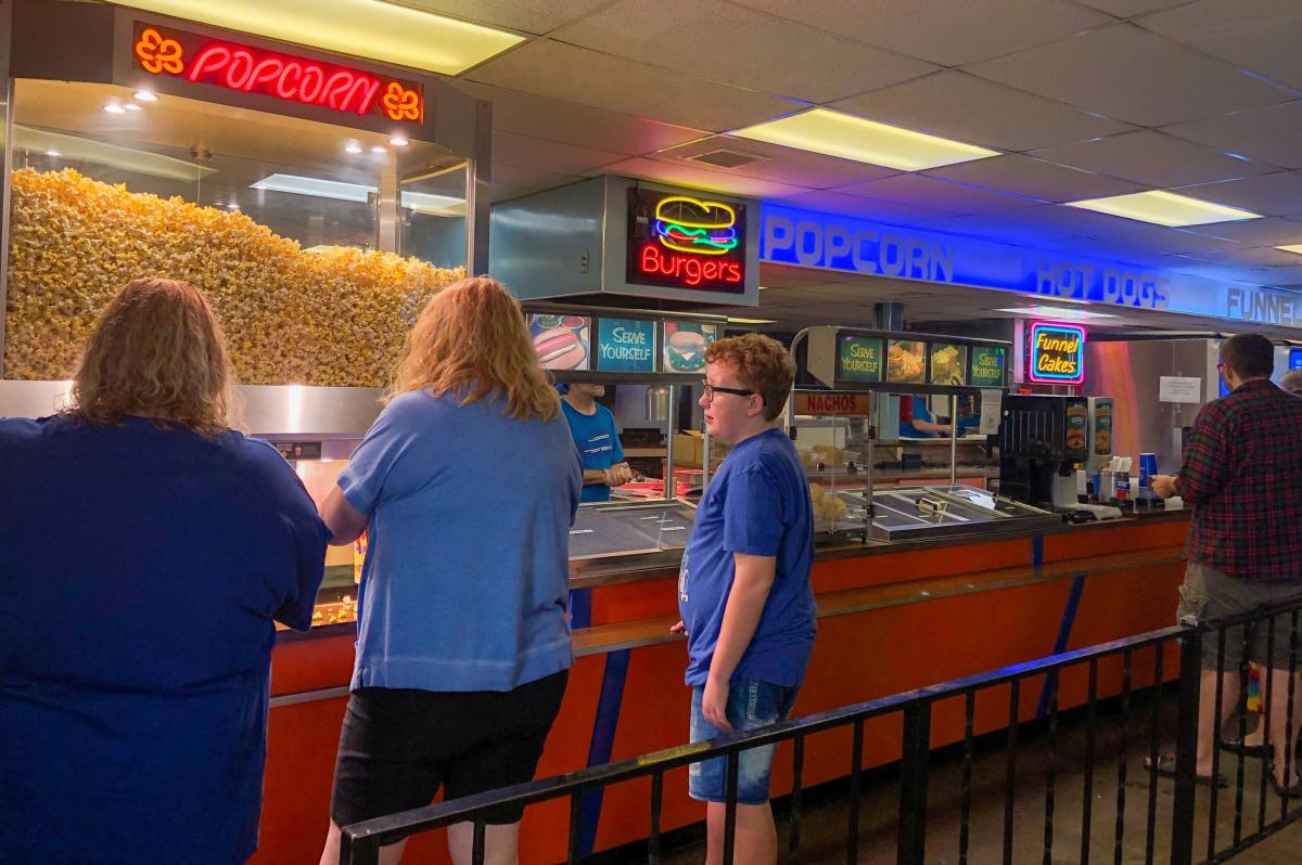 A boy shops concessions at Starlite Drive-in