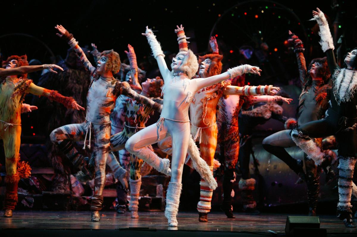 Actors dresses as cats dance on stage during a performance of "Cats"