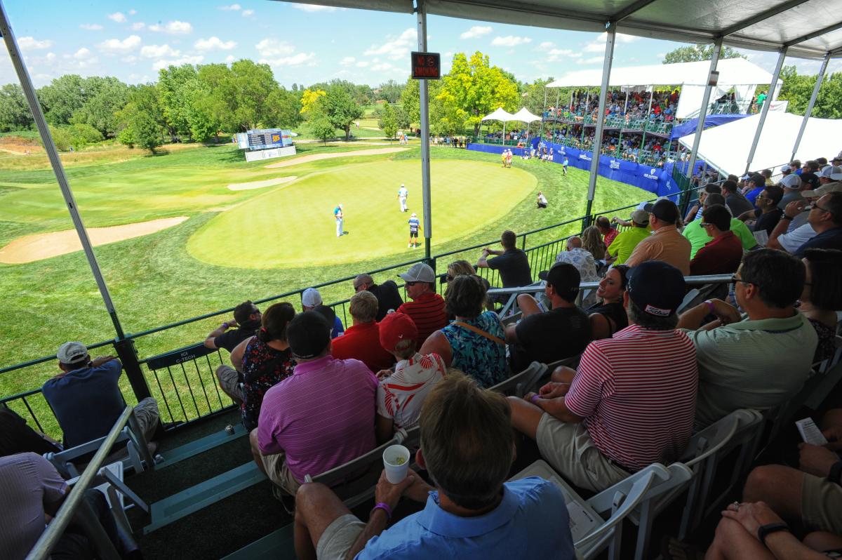 Spectators watch the Air Capital Classic in the bleachers at Crestview Country Club