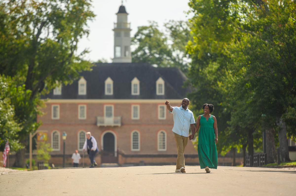 Couple walking around Colonial Williamsburg