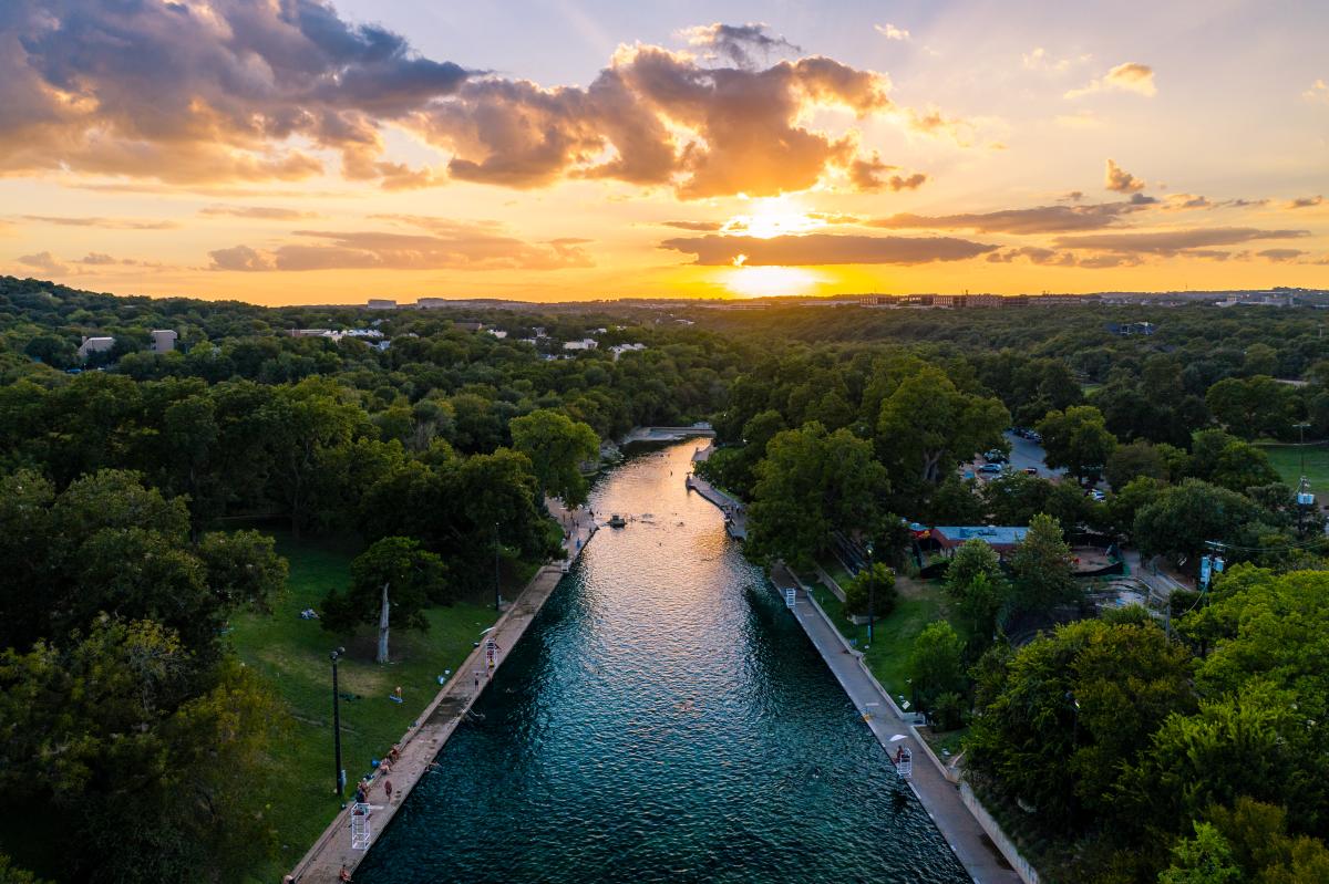 Aerial view of Barton Springs Pool at Sunset in Austin Texas