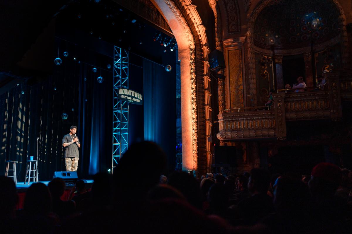 Image of Deon Cole performing at Paramount Theater during Moontower Comedy Fest.