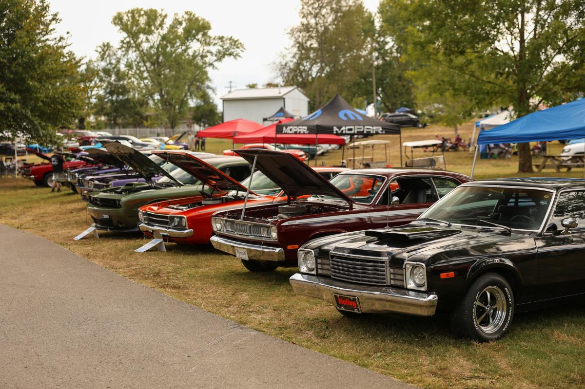 Cars lined up on the grass at "Holley MoParty," at Beech Bend Raceway in Bowling Green, Ky.