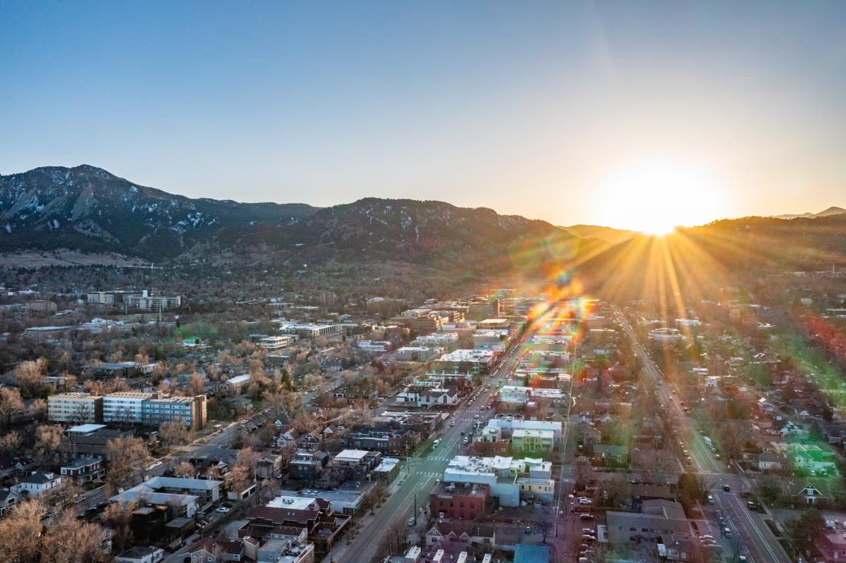 Aerial photo of downtown Boulder and the foothills in the winter