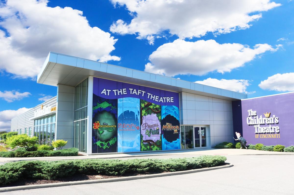 Image of the front entrance to the Children's Theatre of Cincinnati with a listing of the upcoming theater productions.