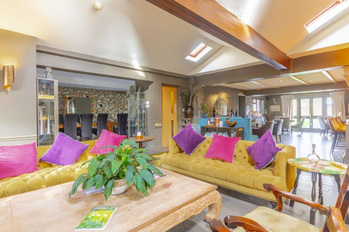 The bright lounge bar area at Pettifers Hotel