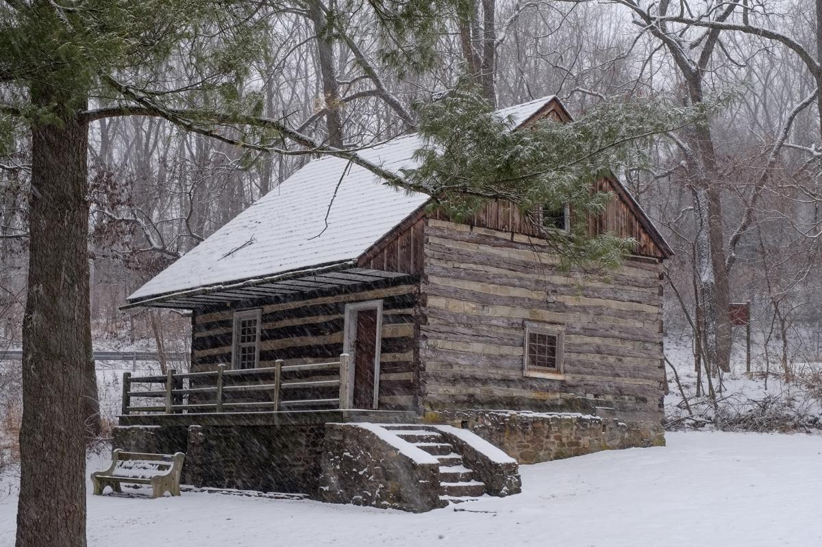 Hunter's Log Cabin blanketed in snow