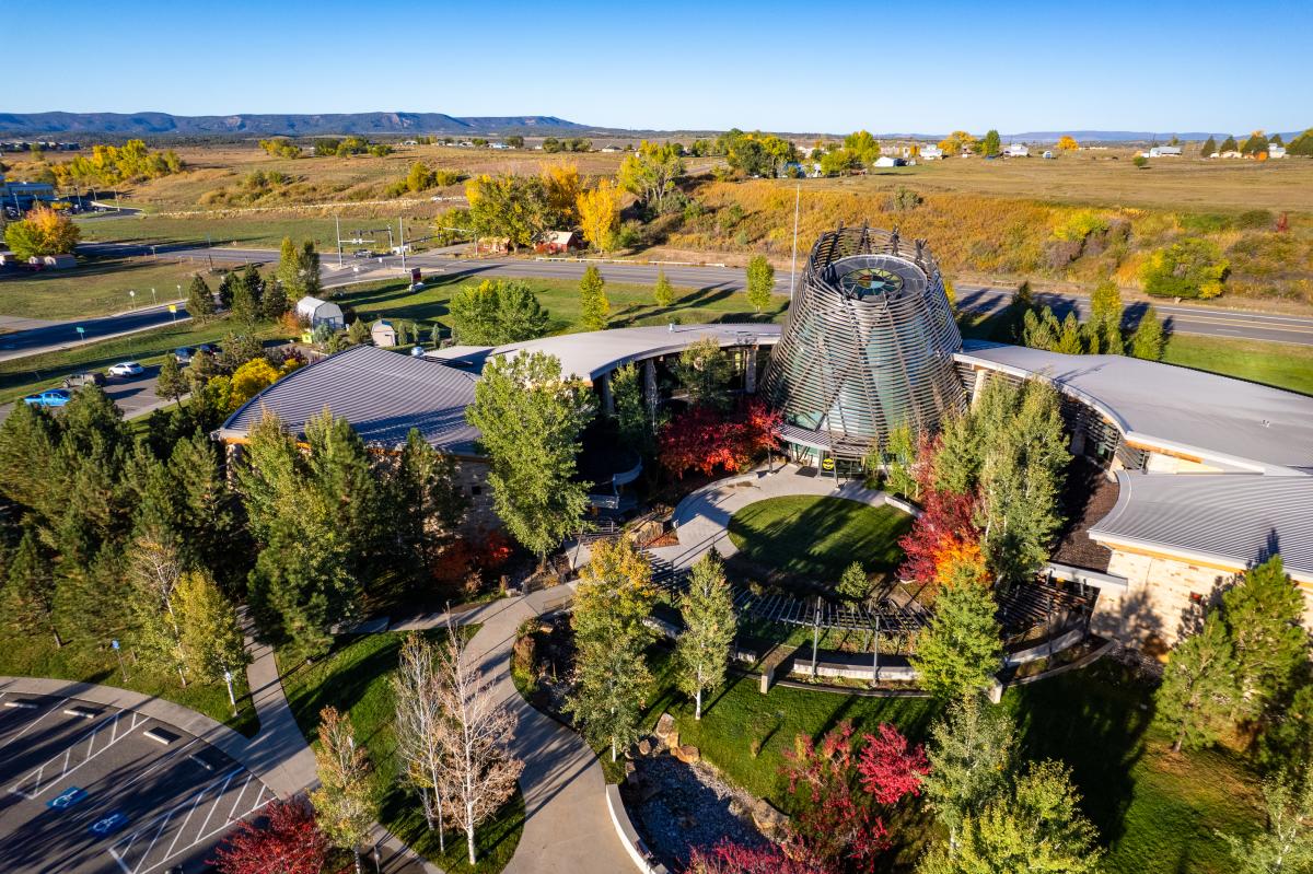 Wide aerial shot of the Southern Ute Cultural Center and Museum During Fall in Ignacio