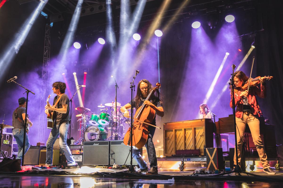 A band on stage at Blue Ox Music Festival