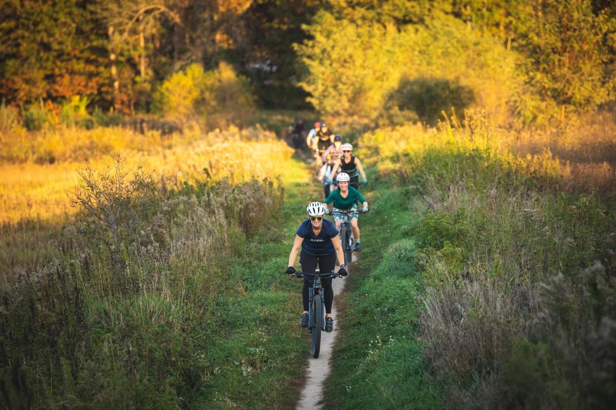 A group of women mountain biking at Lowes Creek County Park in Eau Claire, WI